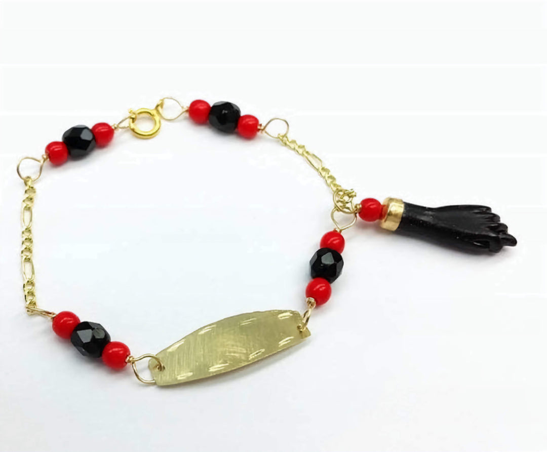 Solid 10K Gold Azabache Bracelet for babies to protect them from the evil eye with black hand and red beads.