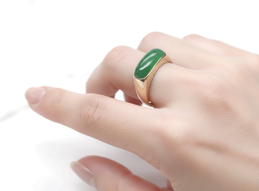 14k Solid Gold Cabochon Jade Saddle Ring on a finger